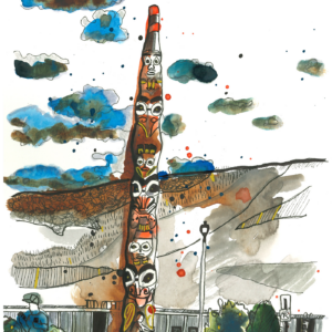 Totem Pole in Jasper, British Columbia against a sky full of moody clouds