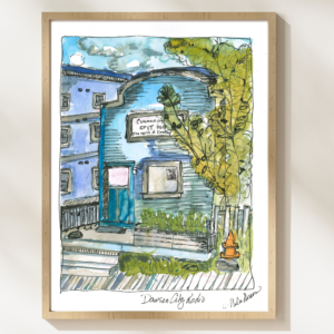 Print mockup of urban sketch of Dawson City Radio, Yukon